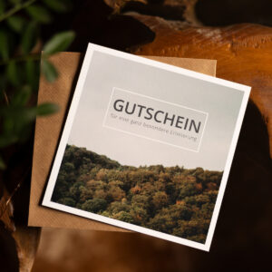 Schön verpackter Wertgutschein in Papierformat für ein Fotoshooting oder Foto-Event bei Kim Kärger Photography